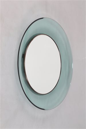 INGRAND MAX (1908 - 1969) Specchio in cristallo, curvato e molato, con...