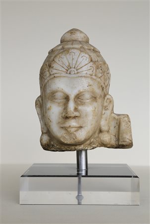 - Kopf eines Buddha, Indien, 16./17. Jh.;Marmor, Höhe 19 cm Erworben in...