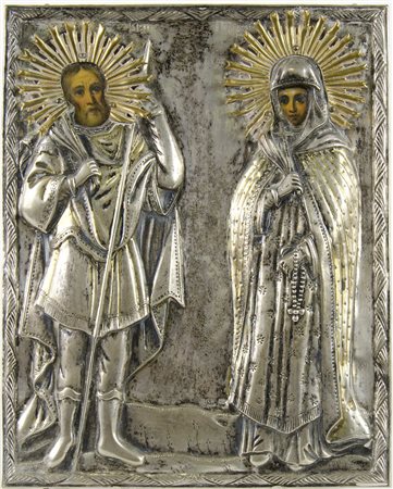 Icona dipinta su tavola due figure con riza in argento sbalzato. cm. 24x19.