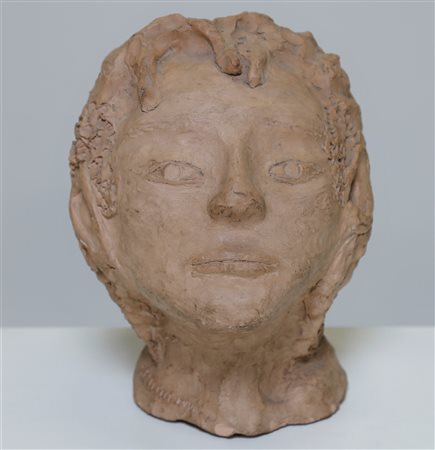 PELLINI EROS (1909 - 1993) Il volto. Terracotta. Cm 20,00 x 28,00 x 25,00....