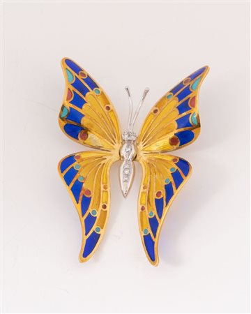 Spilla-ciandolo in oro giallo e bianco a forma di farfalla decorata con...