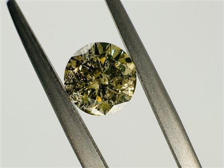 1 DIAMOND 0,91 CT FANCY. GIALLO VERDOGNOLO - I2 – TAGLIO BRILLANTE – INCISO...