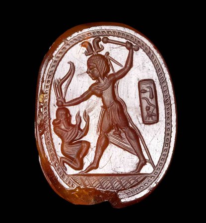 AN EXTRAORDINARY PHOENICIAN - EGYPTIAN CARNELIAN SCARAB. SUBMISSION SCENE WITH A CARTOUCHE.