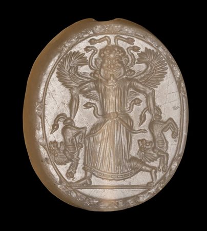AN EASTERN GREEK LATE ARCHAIC-EARLY CLASSICAL CHALCEDONY SCULPTED AND ENGRAVED SCARABOID SEAL. HEAD OF A GORGONE / GORGONE HOLDING TWO LIONS. 