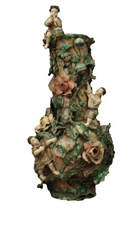  
Napoli. Mollica(?) Grande vaso con decoro a rilievo di fiori e bambini 
 cm 72x34x16