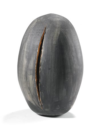LUCIO FONTANA 1899 - 1968 CONCETTO SPAZIALE signed, painted terracotta....