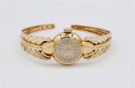Orologio da signora con bracciale rigido in oro 750, Baume & Mercier