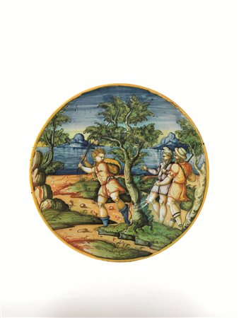 PIATTO Urbino, 1570-1580Maiolica decorata in policromia con giallo, arancio,...