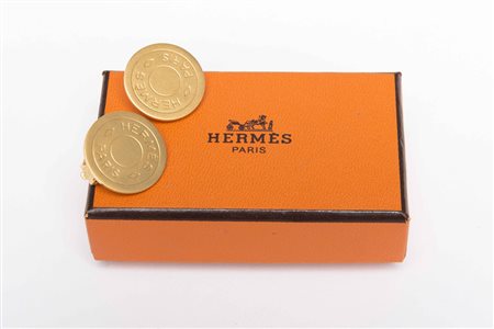Hermes Paris: orecchini a clip color oro di forma circolare e logati, in...