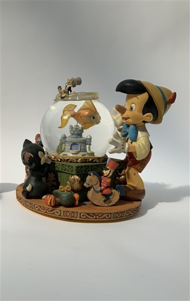 Carillon Disney con snow globe a tema Pinocchio. Vetro e resina