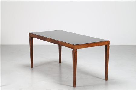 SCREMIN LUIGI (1896 - 1983) Tavolo in noce nazionale, con piano in cristallo...