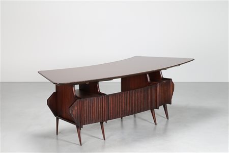 GOTTARDI MARIO Attrib. Scrivania a mmezza luna in palissandro con piano in...
