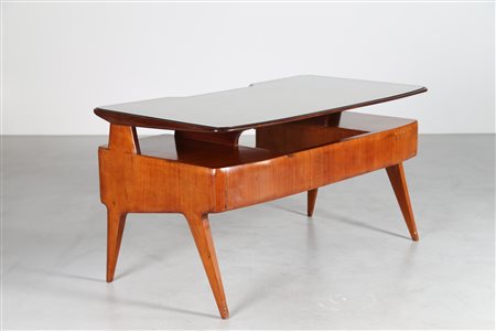 BATTAINI GIANCESARE Scrivania in palissandro india con piano in vetro, anni...