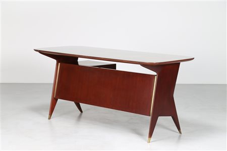 PONTI GIO' (1891 - 1979) Scrivania in palissandro con piano in vetro e...
