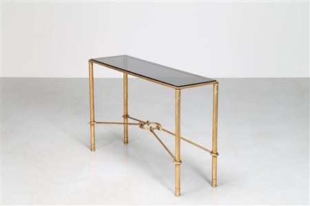 BANCI GIOVANNI Consolle in ferro dorato con piano in vetro, anni 70. -. Cm...