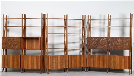 MANIFATTURA ITALIANA Tre librerie a tre montanti in noce massello, le ante...