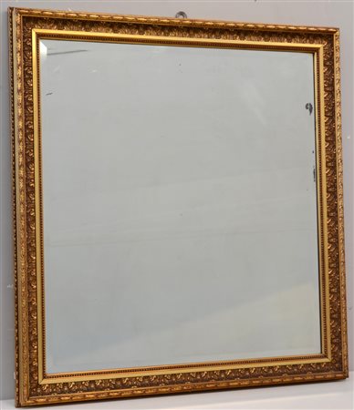 Specchiera entro cornice dorata decorata a racemi (cm totali 98x92) (lievi...