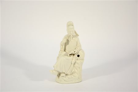 Letterato in porcellana Blanc-de-Chine, con certificazione, Cina (h. 25 cm.)...
