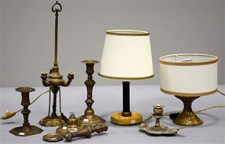 Lotto composto da sette candelieri di materiali e misure diverse (difetti e...