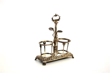 Cruet-stand in argento sbalzato e inciso, secolo XIX (gr 550 ca) (h cm...