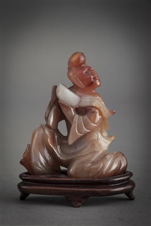 Figurina in corniola (difetti) Cina, sec. XX A carnelian carving. China, 20th...