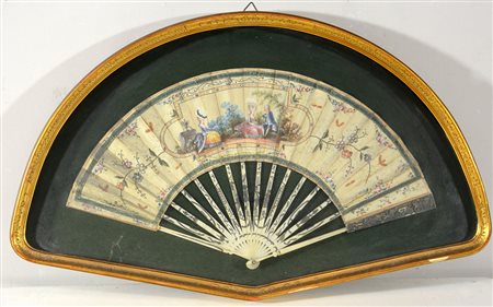 Arte del secolo XIX.Ventaglio con stecche in avorio decorato da applicazioni...