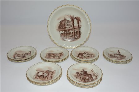 Servizio da tavola in porcellana tedesca decorata in monocromia a scorci...