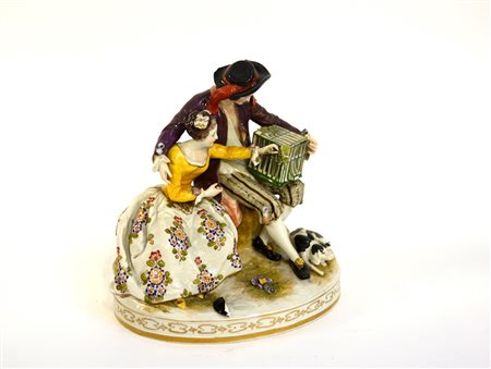 Manifattura tedesca. Gruppo in porcellana decorata in policromia raffigurante...