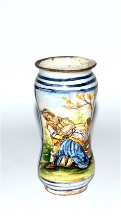 Albarello in maiolica decorato a scene di vita in policromia (h cm 21)...