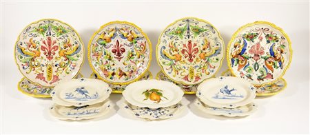 Otto piatti in maiolica con decoro a raffaellesche (difetti) e sei vassoietti...