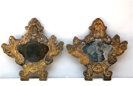 Coppia di cartaglorie in metallo sbalzato, sec XIX (cm 40x40) (difetti)