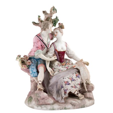 Gruppi in porcellana policroma raffiguranti: A "Scena galante con coppia in...