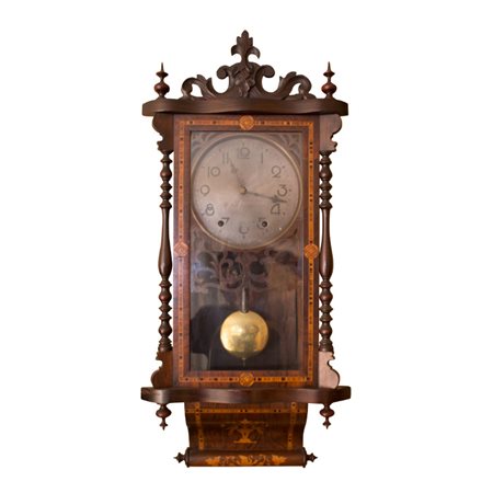 Coppia di orologi a pendolo: A Orologio a pendolo; B orologio a pendolo....