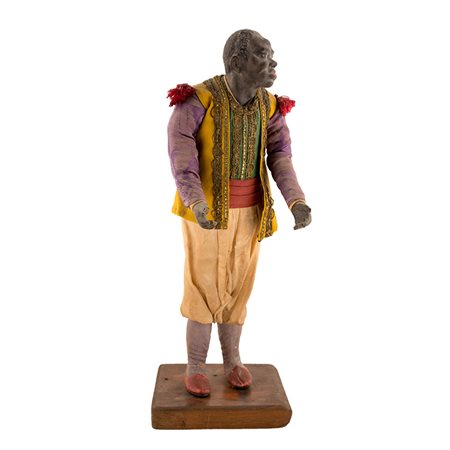 Sette figure stanti di popolani in abiti tradizionali. A figura maschile...