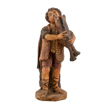 Dieci figure stanti di presepe. A Figura maschile di zampognaro; B Figura...