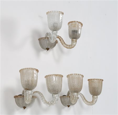 BAROVIER & TOSO Tre appliques in vetro pulegoso a foglia oro, anni 40. -. Cm...