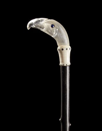 Bastone in ebano con nodi decorati da cabochon in avorio. Impugnatura in...