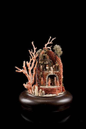 Piccolo presepe con elementi in corallo rosa, pietre dure e altri materiali....