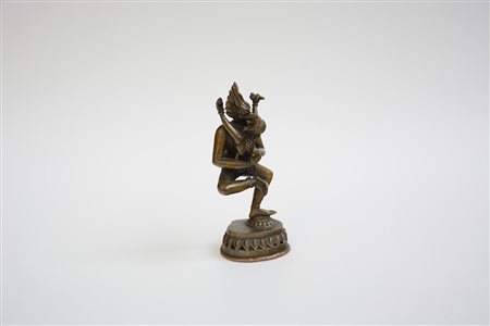 Scultura in bronzo dorato raffigurante divinit‡ induista con consorte (h. 20...