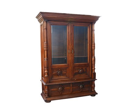 Armadio libreria con struttura architettonica in legno e decori ad intaglio....