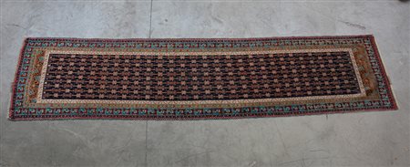 Passatoia GandjiË, Caucaso secolo XX. Disegno a griglia su fondo blu (cm...