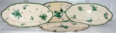 Quattro vassoi ovali polilobati in maiolica decorati 'a fiori verdi'...