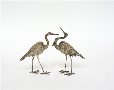 Coppia di aironi in argento. Spagna, sec. XX (gr 130 ca.) (h. cm 17,5) (lievi...