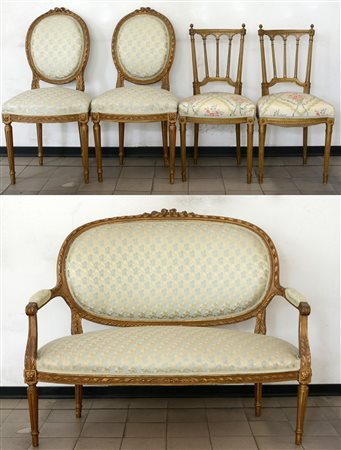 Fornitura da salotto composta da divano e due coppie di sedie in legno...