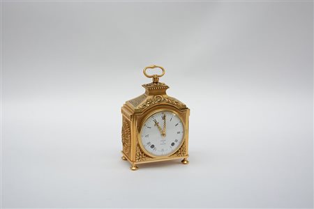 Orologio "Marescialla" in bronzo dorato decorato a motivi vegetali con...