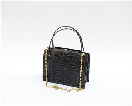 Borsetta in pelle di coccodrillo baby con applicazioni in metallo dorato,...