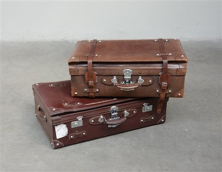 Lotto composto da due valigie di misure diverse (difetti)