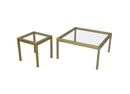 Lotto di due tavolini con struttura in alluminio dorato e piano in vetro (cm...