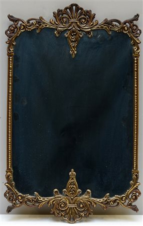 Piccola specchiera con cornice in bronzo decorata a volute (cm 65x39) (lievi...