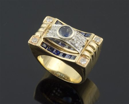 Anello a ponte in oro bicolore con zaffiri e diamanti per ca ct 0,30